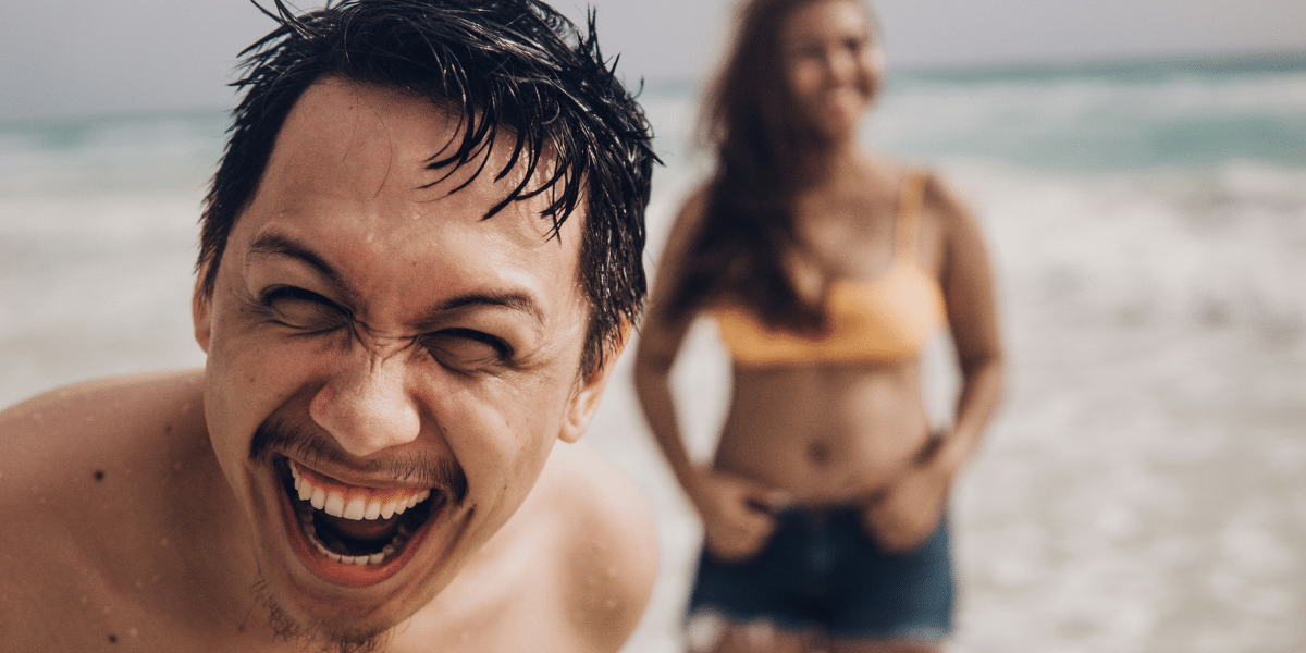 Filipino people playing at the beach