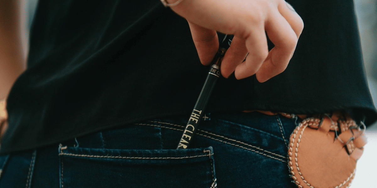 Image commercially licensed from: https://unsplash.com/photos/person-in-blue-denim-jeans-holding-black-leather-sling-bag-Si_5RzZwiuo