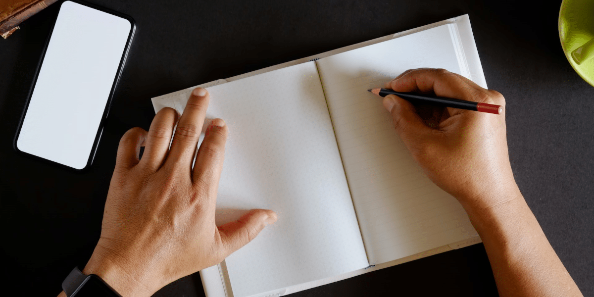Image commercially licensed from: https://unsplash.com/photos/man-freelancer-writing-on-notebook-at-home-or-office-d6EW0cec1Jk